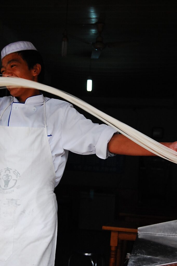 Man pulls noodles!